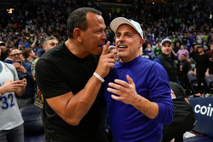 Apr 12, 2022; Minneapolis, Minnesota, USA; Minnesota Timberwolves co-minority owners Alex Rodriguez and Marc Lore celebrate a victory over the Los Angeles Clippers after a play-in game at Target Center.